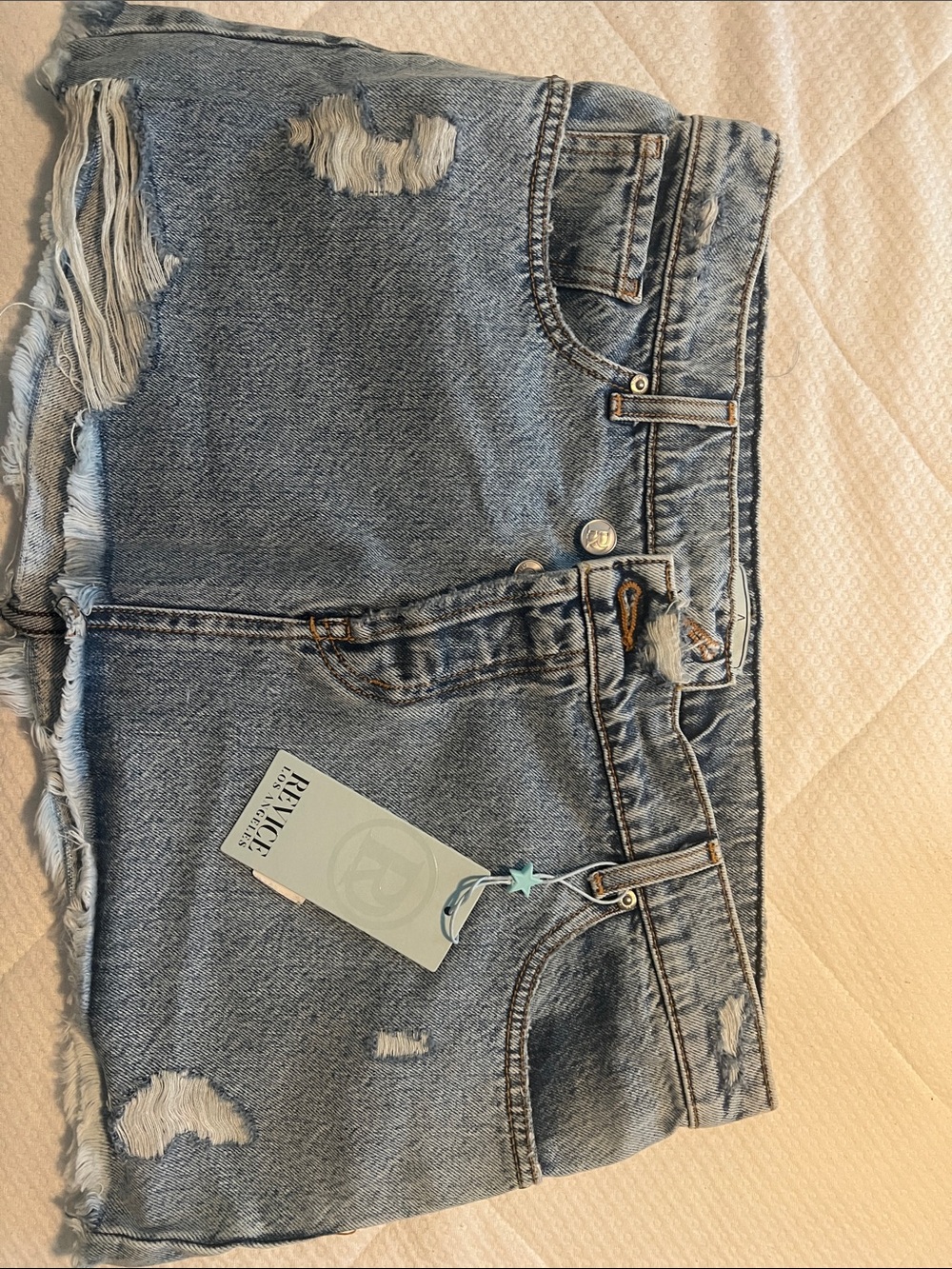 REVICE Light Blue Distressed Denim Mini Skirt
